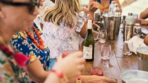 Table of people enjoying drinks at Babydoll Wines brand activation